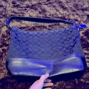 Coach purse with dust cover